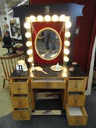To provide the user with a convenient place to store clothing. Makeup Desk With Mirror And Lights Online