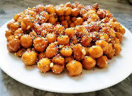 In naples, this is traditionally a christmas dessert, but in the rest of italy, these delicious honey balls are a delicacy for all major festivities! Italian Honey Balls Struffoli Recipe Yankee Magazine