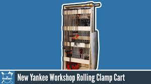 A diy clamp rack that mounts to the wall and swings out so that you can store clamps on both sides. How To Make A Rolling Clamp Rack New Yankee Workshop Youtube