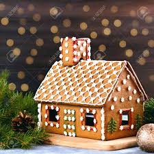 You can enjoy the ginger bread biscuits as they are but they're not really proper gingerbread men without adding some icing decorations. Decorated Gingerbread House Closeup With Pine Decorations And Stock Photo Picture And Royalty Free Image Image 129681233