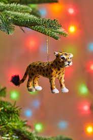 Glass cheetah ornament wears a bejeweled collar for a regal vibe. Cheetah Christmas Ornament Christmas Ornaments Picture Frame Ornaments Funny Ornaments