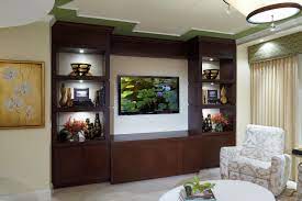 Interior design by urbanclap professional umesh vishwakarma. Drawing Room Wall Almirah Design