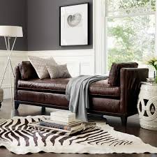 Metallic cowhide rugs are all unique in pattern, size, and shapes. Chocolate Stenciled Zebra Cowhide Rug Williams Sonoma