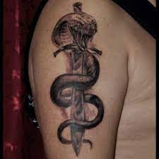 Sword Tattoo Meanings Itattoodesigns Com Sword Tattoo Snake Tattoo Sword Tattoo Meaning