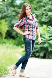 Use them in commercial designs under lifetime, perpetual & worldwide rights. Beautiful Teen Girl Standing Outdoor In Jeans And Checked Shirt Stock Photo Picture And Royalty Free Image Image 52376436