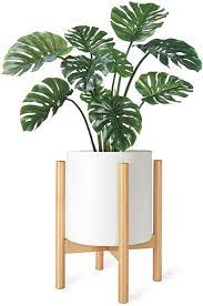 Many are available in elaborately designed 2 tiered plant stand are found in quirky and fun designs such as animal patterns, cartoon shapes and so on. Amazon Com Mkono Plant Stand Mid Century Wood Flower Pot Holder Plant Pot Not Included Modern Potted Stand Indoor Display Rack Rustic Decor Up To 10 Inch Planter Natural Garden Outdoor