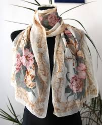 Learn how to crochet shawls and wraps with mikey of the crochet crowd. Shawl With A Floral Pattern Gem