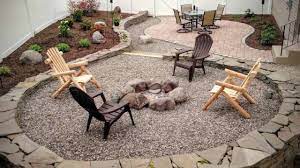 Our pit is surrounded with pea gravel, a couple of refurbished park benches. Building A Backyard Patio And Firepit Youtube
