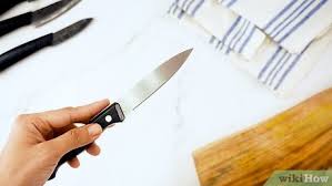 3 Ways To Use A Paring Knife Wikihow In this lesson, i cover the basic way to hold a knife and the best position on the body to keep it during a fight. 3 ways to use a paring knife wikihow