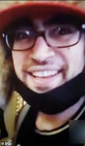 Man filmed smashing windows in the US Capitol next to rioter Ashli Babbitt  is arrested