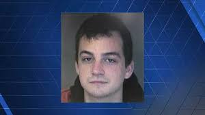 Man accused of stealing from police cruiser