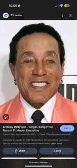 Why do Smokey's earrings look like cufflinks from The Men's Warehouse?!