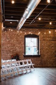 An Industrial Wedding Venue In Spokane Washington Known For Exposed Brick Walls Rustic Wood B Industrial Wedding Venues Brick Wedding Venue Event Venue Design