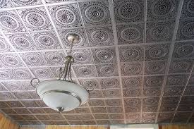 A dropped ceiling is a secondary ceiling, hung below the main (structural) ceiling. Metal Ceiling Tiles Pros And Cons Eye Catching Ceiling Ideas