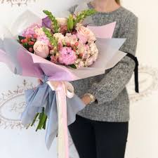 Designed, arranged, & ready to be enjoyed. Hide Paper Wrapped Le Bouquet Fleurs