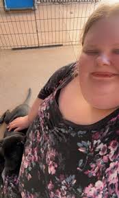 Pictures of dogs reading wanted by librarian