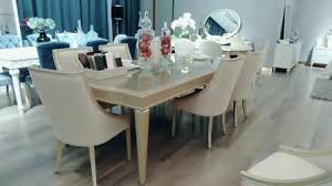A grand centerpiece, the rectangular table is handsomely finished and enriched by tapered legs and mirror insert top and edges. China Wooden Champagne Gold Dining Table With Mirror Decoration China Dining Table And Chairs Glass Dining Furniture