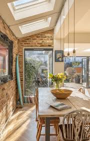 Home Renovation Kitchen Extension Family Room Sloped Roof Folding Doors Internal Brick Wall Kitchen Extension Family Room Home Interior Design Home