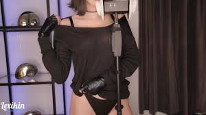 Lexikin ASMR Fantastic ASMR! Her soft voice is very relaxing and also her  soft moans. She starts with ear licking a bit than she takes her shirt off  showing her bra.