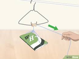 Pulleys in action, using mechanical advantage to make work easier, adding more pulleys (wraps of rope) made pulling the two brooms. How To Build A Pulley Wikihow