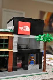 Custom City Clothes Sports Store Model Built By Absdistributors Lego Store Lego Display Cool Lego Creations