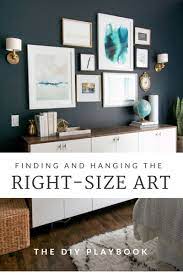 How To Properly Hang Art On Your Wall Height Distance The Diy Playbook Hanging Wall Art Wall Art Placement Home Decor