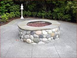 Pin By Jill D Alessandro On Outdoor Ideas Fun Landscaping With Rocks Fire Pit With Rocks Backyard Firepit Area