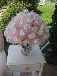 Just face it, you'll be tossing diapers into the garbage at angles you never really thought you'd even attempt before. Diaper Bouquet Diaper Bouquet Baby Shower Diy Baby Shower Fun