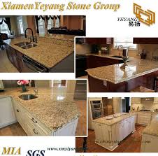 This rustic kitchen island gets along well with the other furniture and fixtures including the recessed lamps that are usually installed in a modern kitchen. China Gold Yellow Beige Granite Stone Tiles Countertop Vanity Tops For Kitchen Islands China Granite Slab Kitchen Countertop