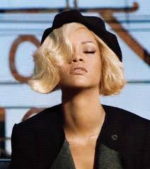 Rihanna lovely long wavy hairstyles with bangs/ pacificcoastnews.com. 10 Best Rihanna Short Blonde Hair