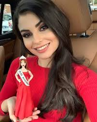 So cute! Miss Supranational Romania 2018 Andreea Maria Coman was given a  doll just like her : ) #MissSupranational #MissSupranational2018  #MissSupranationalRomania2018 #MissRomania #romania🇹🇩