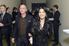 It's probably best that you're sitting down for this. Jeff Bezos Took Lauren Sanchez To Meet Emmanuel Macron