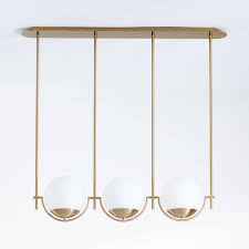 E modern chandelier w/ glass shades e 7 globe lights provide a warm, radiant glow e adjustable pendant poles offer up to 3.5 ft. Rondure Three Globe Pendant Light Reviews Crate And Barrel