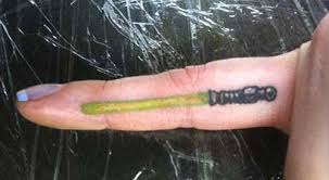 Hop in the falcon, we're flying to the tattoo studio for 1 of these tiny star wars ink ideas. Lightsaber Finger Tattoo Funny Bizarre Amazing Pictures Videos