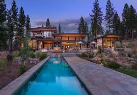 This hotel features an outdoor pool and a fitness center. Modern Home Celebrates Indoor Outdoor Living In Sierra Nevada Mountains