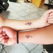 Gai tattooing his bride on their wedding day, from tattoo by gai in koh samet, thailand. 127 Mother Daughter Tattoos To Help Strengthen The Bond Wild Tattoo Art