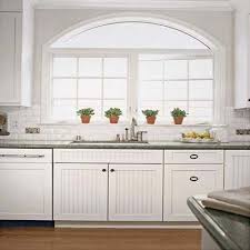 white beadboard kitchen cabinets