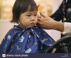 Baby Hair Cut High Resolution Stock Photography And Images Alamy