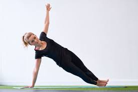 Plank pose, which is called kumbhakasana in sanskrit, is one of the most foundational poses, or asanas, in yoga. Woman Doing Side Plank Yoga Exercise In Studio Stockphoto