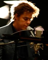 The Whitlams Official added a new...