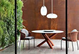 White walls and pale pink furniture allow dramatic pieces on the walls to pop in this dining room by nolen homes. 55 Dining Room Wall Decor Ideas Interiorzine