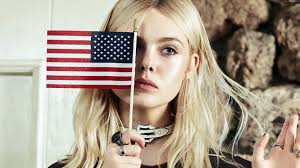 patriotism, headshot, government, one person, young adult, long hair, young  women, flag, actress, Elle Fanning, 4K, hairstyle, beautiful people,  holding HD Wallpaper