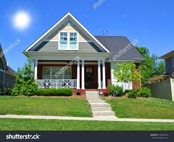 Beautiful New England Style Suburban American Home With Large Front Porch In Th Front Yard Landscaping Design Front Yard Landscaping Front Walkway Landscaping