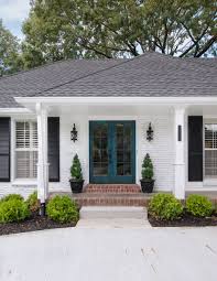 Color for front door on a yellow house luv door color goes with light gray house black shutters front door color inspiration house exterior the dos and don ts of love the charcoal grey with black shutters and red door house. White Brick Exterior With Black Shutters And Double Door Painted Turquoise Brick Exterior House White Exterior Houses Ranch House Exterior