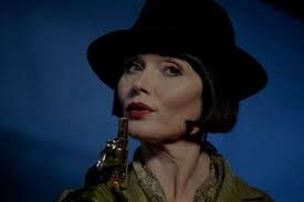 Armed with her pearl-handled Smith & Wesson in one hand and a cocktail the  other, the Hon. Phryne Fisher has arrived!