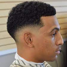 Taper fade haircut with waves. Taper Fade Afro Haircuts 77 Taper Fade Haircut Fade Haircut Tapered Haircut