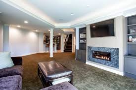 75 beautiful basement with a wood stove a fireplace insert or wood stove vermont castings photo galleries moving hot air how to heat your house side vent for a wood burning stove. 20 Amazing Finished Basements That Have A Fireplace