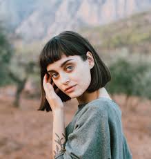 I love the straightness of her hair and how playful it seems. Blunt Bangs Styling Tips And Looks To Try