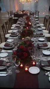 Burgundy Flowers Against Black Table Fall Wedding Colors Burgundy And Grey Wedding Wedding Table Linens