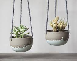 We did not find results for: Small Plant Hanger Turquoise And Grey Ceramic Hanging Planter Cute Planter Cactus Succulent Pl In 2021 Small Potted Plants Ceramic Succulent Pots Plant Pot Covers